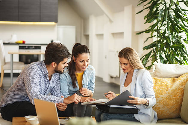 A consultation meeting discussing air conditioning solutions for home or business needs.